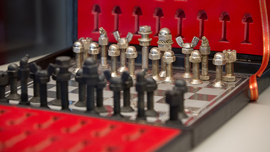 A chess set designed with bolts