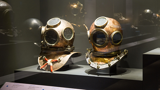 DIVING HELMETS  Right: Made in Germany (LUDWIG VON BREMEN), for the Danish Royal Navy Copper, Brass and Glass 